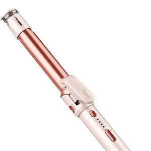 New straightener & curler. Never used. Brand new